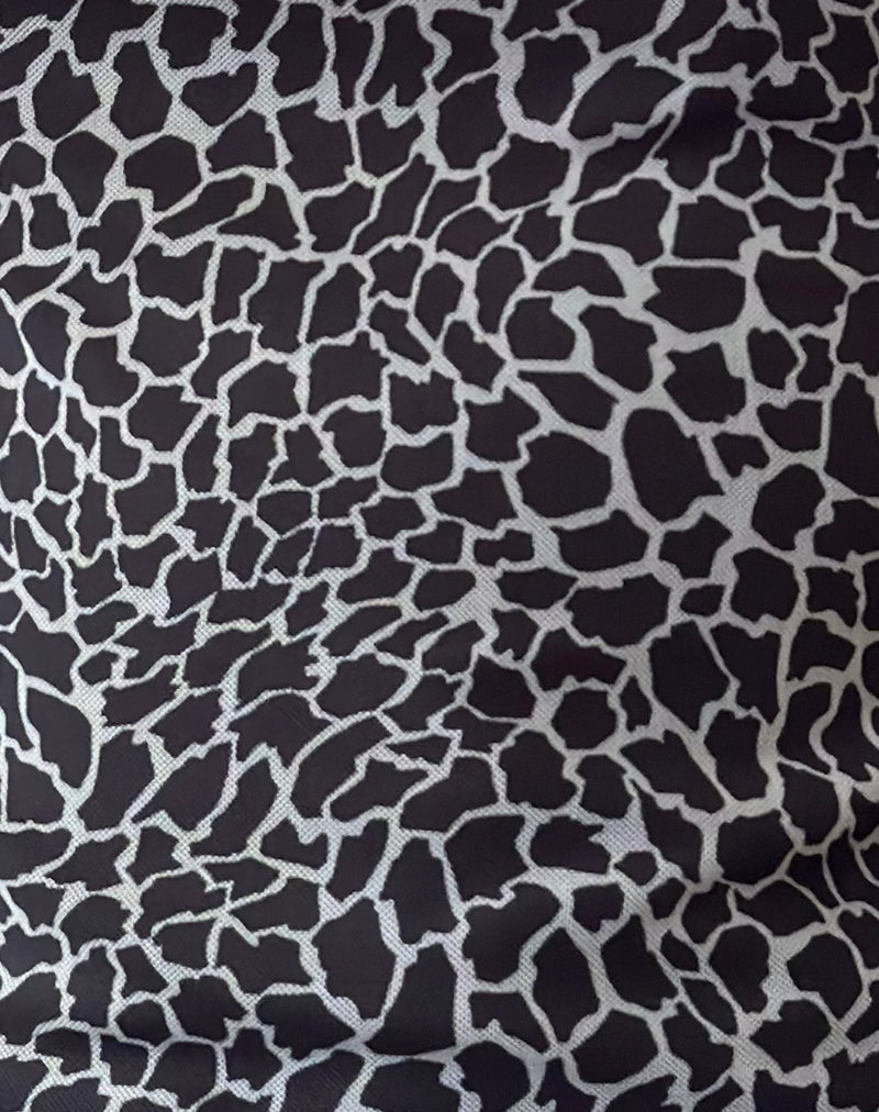 Image of Jaridah Asymmetric Slouch Top in Giraffe Black and Cream