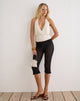 Image of Renuka Capri Trousers with Frill Hem in Knit Black