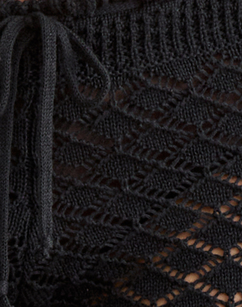 Image of Renuka Capri Trousers with Frill Hem in Knit Black