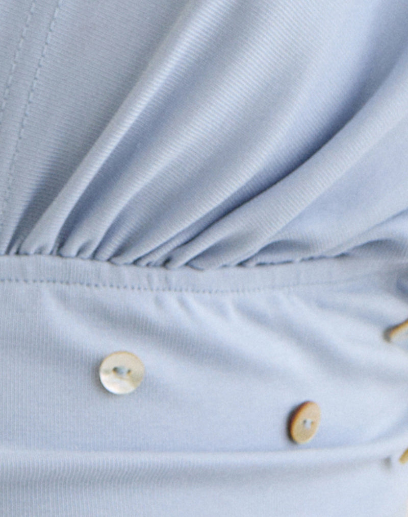 Image of Vernia Plunge Batwing Top in Lyocell Dusty Blue with Pearl Buttons